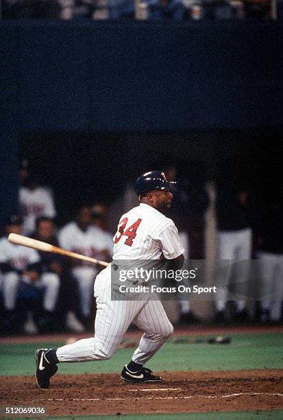 Outfielder Kirby Puckett of the Minnesota Twins bats during a Major League Baseball game circa 1993 at the Hubert H. Humphrey Metrodome in...