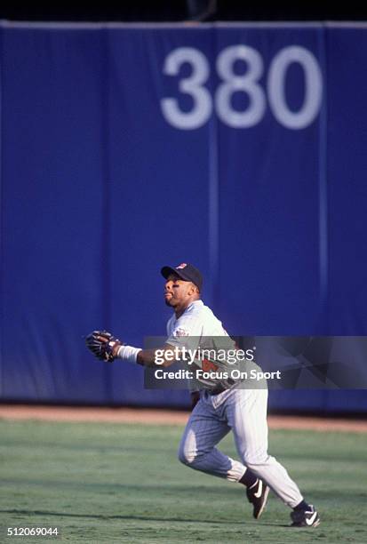 Outfielder Kirby Puckett of the Minnesota Twins chases after a fly ball during a Major League Baseball game circa 1993. Puckett played for the Twins...
