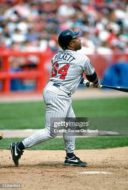 Outfielder Kirby Puckett of the Minnesota Twins bats against the Milwaukee Brewers during a Major League Baseball game circa 1994 at Milwaukee County...