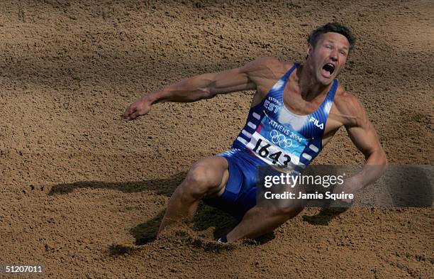 Erki Nool of Estonia competes in the long jump discipline of the men's decathlon on August 23, 2004 during the Athens 2004 Summer Olympic Games at...