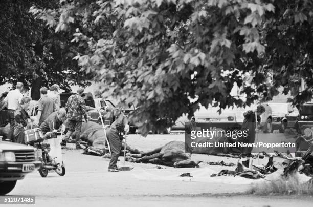 View of the aftermath of the Hyde Park bombing with dead horses from the Blues & Royals cavalry regiment lying in South Carriage Drive following the...