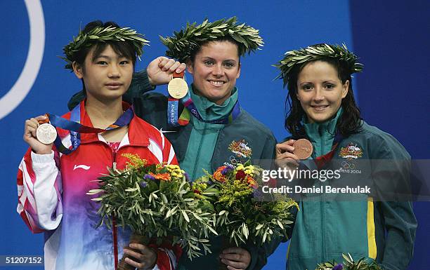 Lishi Lao of China , Chantelle Newbery of Australia and Loudy Tourky of Australia display their medals for the women's diving 10 metre platform event...