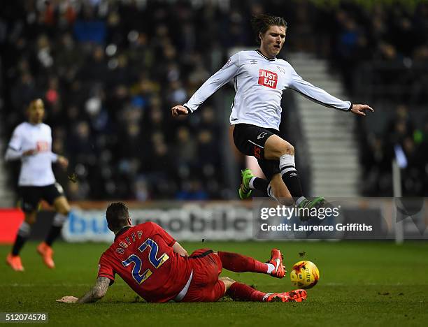 Jeff Hendrick of Derby County leaps over Shane Duffy of Blackburn Rovers during the Sky Bet Championship match between Derby County and Blackburn...