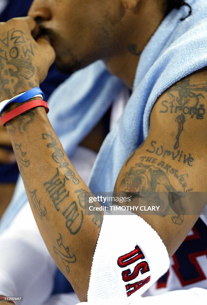 The United States' Allen Iverson, with tattooed arm, sits on the... News Photo - Getty Images The United States' Allen Iverson, with tattooed arm, sits on the... News Photo - Getty Images