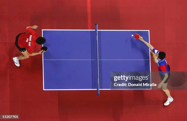 Hao Wang of China and Seung Min Ryu compete in the men's singles table tennis gold medal match on August 23, 2004 during the Athens 2004 Summer...