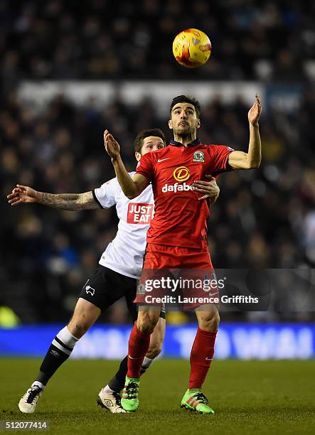 Jacob Butterfield of Derby County battles for the ball with Jordi Gomez of Blackburn Rovers during the Sky Bet Championship match between Derby...