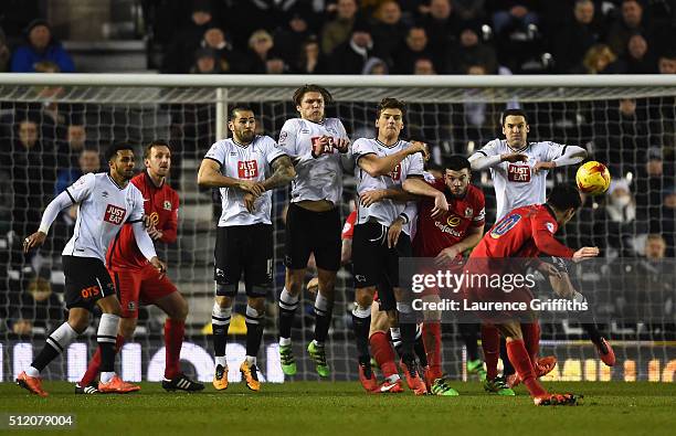 Derby County defensive wall lines up to block a free kick from Ben Marshall of Blackburn Rovers during the Sky Bet Championship match between Derby...