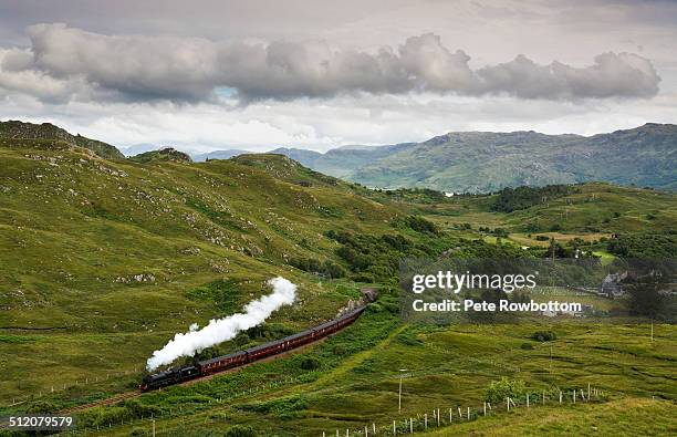 steam train in the mountains - scotland train stock pictures, royalty-free photos & images