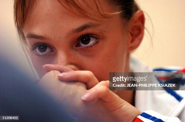French Emilie Lepennec offers a press conference 23 August 2004 in Athens,a day after winning the gold medal in the women's artistic gymnastics...