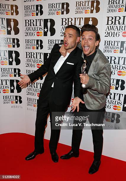 Liam Payne and Louis Tomlinson from One Direction with their British Artist Video of the Year award at the BRIT Awards 2016 at The O2 Arena on...