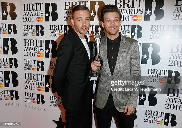 Liam Payne and Louis Tomlinson from One Direction with their British Artist Video of the Year award at the BRIT Awards 2016 at The O2 Arena on...