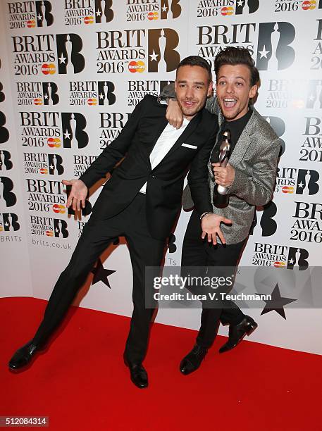 Liam Payne and Louis Tomlinson from One Direction with their British Artist Video of the Year award at the BRIT Awards 2016 at The O2 Arena on...