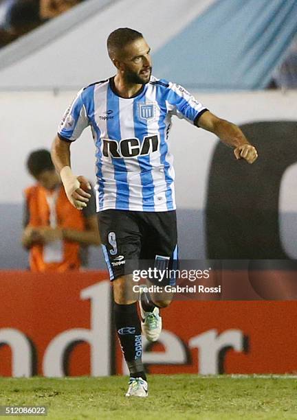 Lisandro Lopez of Racing Club celebrates after scoring the first goal of his team during a group stage match between Racing Club and Bolivar as part...