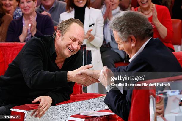 Actor Benoit Poelvoorde, who makes the show !, and Presenter of the show Michel Drucker attend the 'Vivement Dimanche' French TV Show at Pavillon...