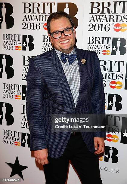 Alan Carr poses in the winners room at the BRIT Awards 2016 at The O2 Arena on February 24, 2016 in London, England.