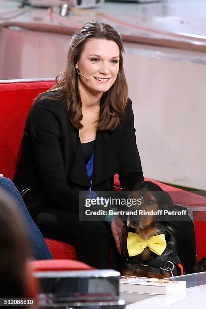 Juliette Roux-Merveille and her Dog attend the 'Vivement Dimanche' French TV Show at Pavillon Gabriel on February 24, 2016 in Paris, France.