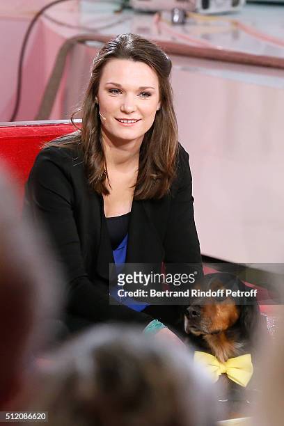 Juliette Roux-Merveille and her Dog attend the 'Vivement Dimanche' French TV Show at Pavillon Gabriel on February 24, 2016 in Paris, France.