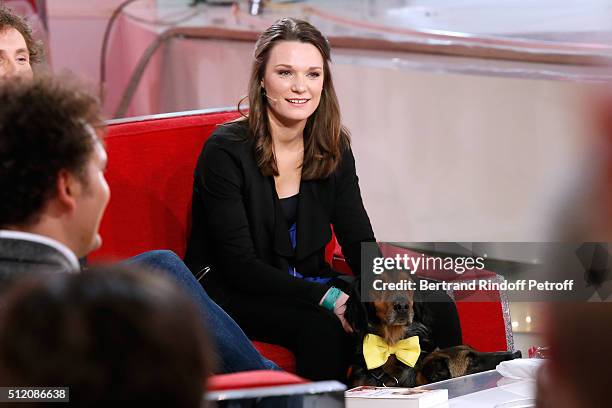 Juliette Roux-Merveille and her Dog attend the 'Vivement Dimanche' French TV Show at Pavillon Gabriel on February 24, 2016 in Paris, France.