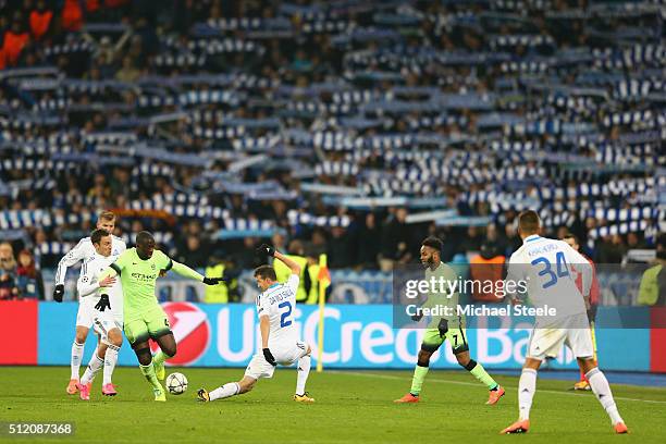 Yaya Toure of Manchester City skips past the challenge from Danilo Silva of Dynamo Kiev during the UEFA Champions League round of 16 match between...