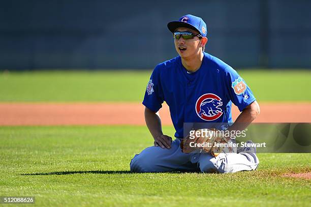 Infielder Munenori Kawasaki of the Chicago Cubs during infield drills at a spring training workout at Sloan Park on February 24, 2016 in Mesa,...