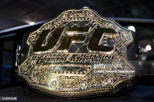 Championship belt is on display during a news conference between UFC featherweight champion Conor McGregor and lightweight contender Nate Diaz at UFC...