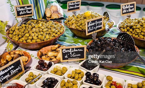 olives at local market - noumea stock pictures, royalty-free photos & images