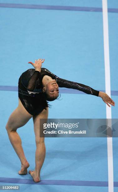 Catalina Ponor of Romania poses during her routine in the women's artistic gymnastics floor exercise finals on August 23, 2004 during the Athens 2004...