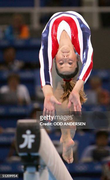Silver medallist Carly Patterson performs during the women's beam final, 23 August 2004 at the Olympic Indoor Hall in Athens during the Olympics...