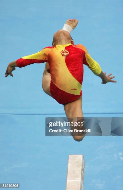 Li Ya of China jumps during her routine in the women's artistic gymnastics balance beam finals on August 23, 2004 during the Athens 2004 Summer...