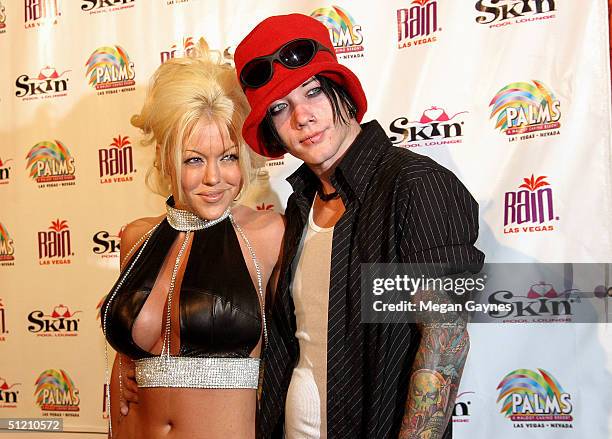 Tiffany and DJ Ashba arrive at the Palms? Girl Competition on August 20, 2004 at Club Xes in Hollywood, California.