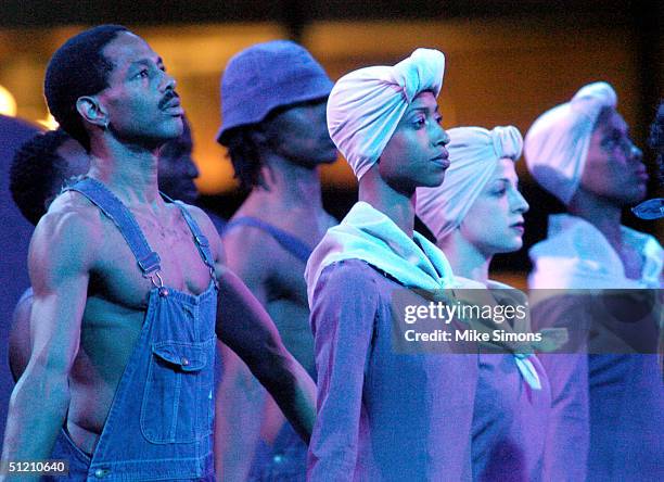 Dancers from Garth Fagan Dance perform during the public dedication for the National Underground Railroad Freedom Center August 23, 2004 in...