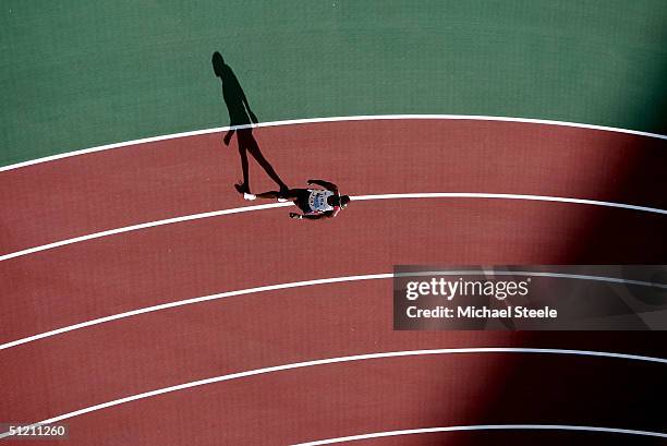 Allen Johnson of USA warms up for th the 110 metre hurdle discipline of the men's decathlon on August 24, 2004 during the Athens 2004 Summer Olympic...