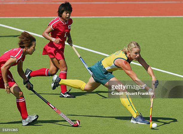 Louise Dobson of Australia surges forward during the women's field hockey classification between Japan and Australia on August 24, 2004 during the...