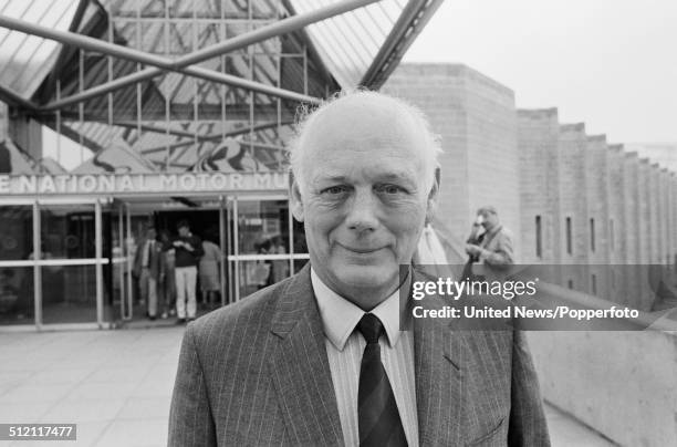 Edward Douglas-Scott-Montagu, Lord Montagu of Beaulieu and 3rd Baron Montagu, posed outside the entrance to the National Motor Museum in Beaulieu,...