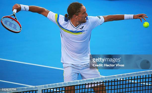 Alexandr Dolgopolov of Ukraine celebrates after winning the game during a singles match between David Ferrer of Spain and Alexandr Dolgopolov of...