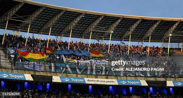 Supporters of Bolivia's Bolivar cheer for their team during their Copa Libertadores 2016 group 3 football match against Argentina's Racing Club at...