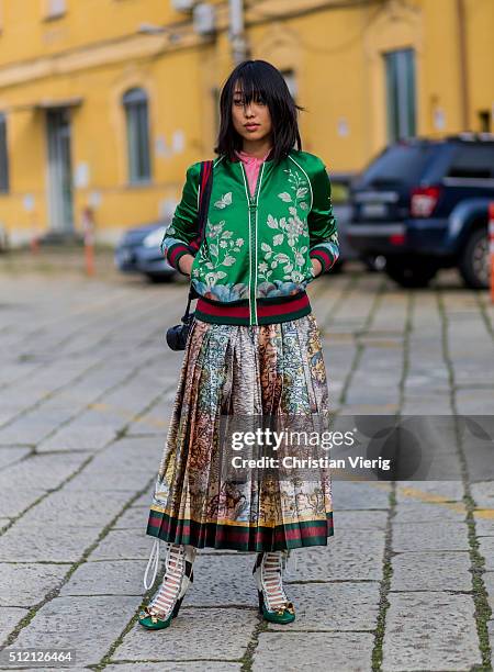 Margaret Zhang wearing Gucci jacket, skirt and shoes seen outside Gucci during Milan Fashion Week Fall/Winter 2016/17 on February 24, 2016 in Milan,...