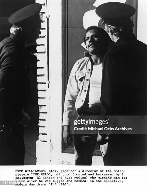 Actor Fred Williamson and Elliott Gould in a scene from the movie "Mean Johnny Barrows" which was released in January 2016.