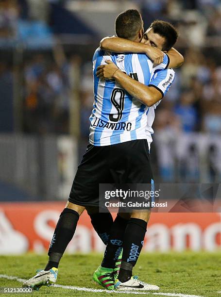 Marcos Acuña of Racing Club and teammates celebrate their team's fourth goal during a group stage match between Racing Club and Bolivar as part of...