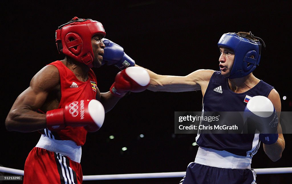 Sarapio Rukundo Sam Rukundo of Uganda and Murat Khrachev of Russia compete during the ...