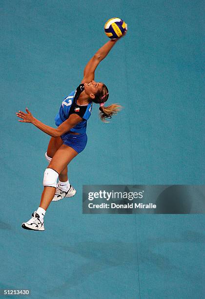 Francesca Piccinini of Italy serves the ball during her team's 2-3 loss to Cuba in the women's indoor Volleyball quarterfinal match on August 24,...