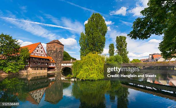view of henkersteg bridge and pegnitz river, nuremberg, bavaria, germany - nuremberg stock pictures, royalty-free photos & images