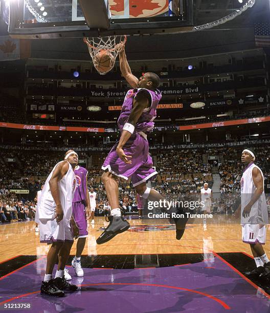 Andre Iguodala of the Philadelphia 76ers makes a dunk during the Vince Carter All-Star Charity Game at Air Canada Centre on July 30, 2004 in Toronto,...