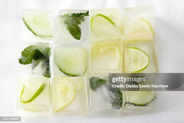 mojito ice cubes - ice cube stock-fotos und bilder