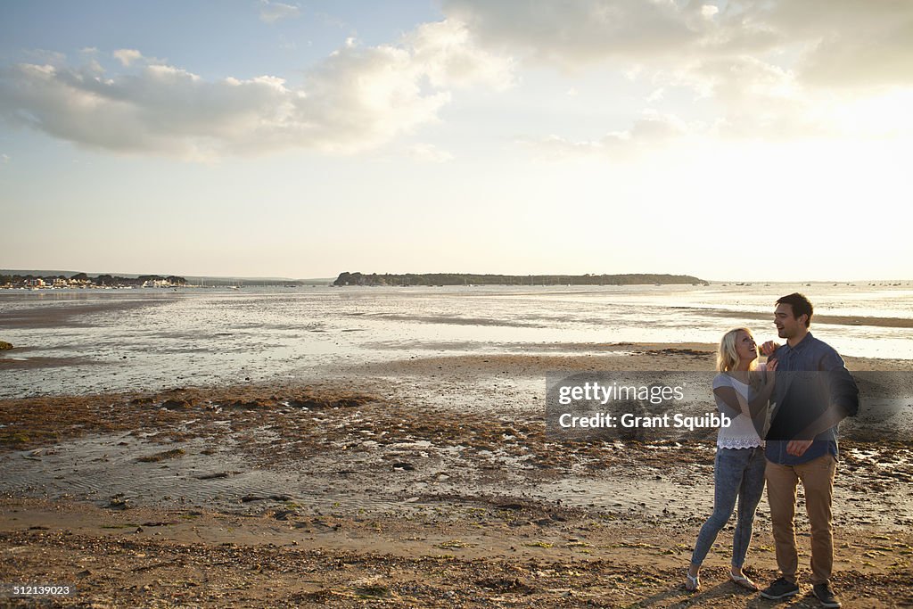 Young couple enjoying beach