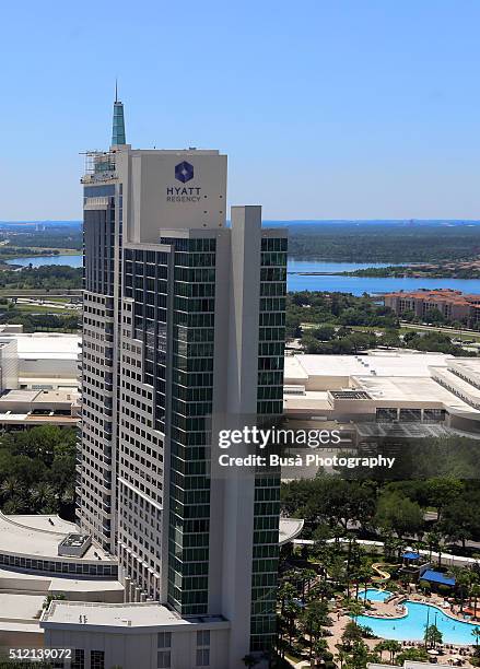 high angle view of hyatt regency hotel in orlando, florida, usa - orlando florida aerial stock pictures, royalty-free photos & images