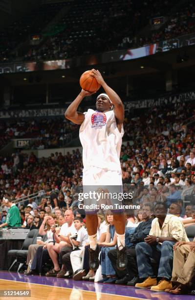 Shammond Williams of the New Orleans Hornets shoots during the Vince Carter All-Star Charity Game at the Air Canada Centre on July 30, 2004 in...