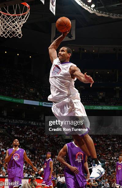 Dahntay Jones of the Memphis Grizzlies dunks during the Vince Carter All-Star Charity Game at the Air Canada Centre on July 30, 2004 in Toronto,...
