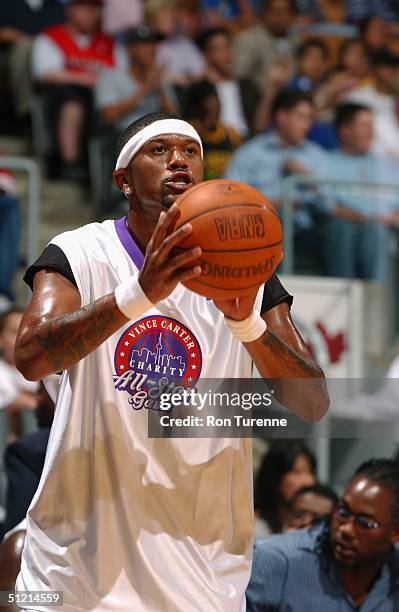 Jalen Rose of the Toronto Raptors shoots during the Vince Carter All-Star Charity Game at the Air Canada Centre on July 30, 2004 in Toronto, Canada....