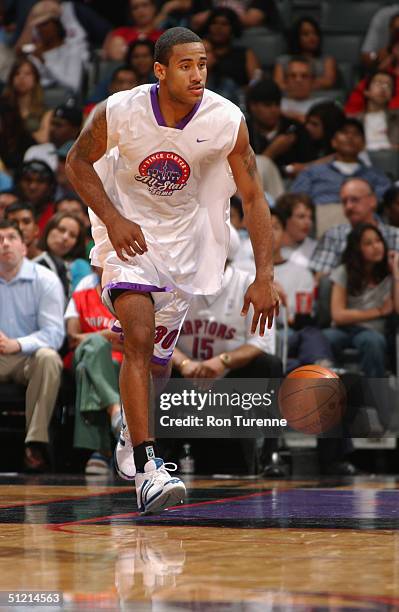 Dahntay Jones of the Memphis Grizzlies drives during the Vince Carter All-Star Charity Game at the Air Canada Centre on July 30, 2004 in Toronto,...